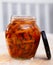 Pickled honey fungi in open jar