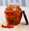 Pickled honey fungi in open jar