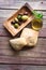 Pickled olives with bread and olive oil on a rustic table