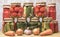 Pickled tomatoes, canned cucumbers and lecho in glass jars. Concept of home canning vegetables for the winter