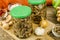 Pickled wild mushrooms in glass jar. Homemade preparations. Studio Photo