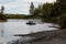 Pickup truck abandoned in the high waters of Alaska river