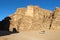 Pickup truck with tourists rides in Wadi Rum desert
