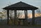 Picnic area with benches, table and sunshade during sunset on top of fruska Gora mountain, Serbia