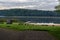 picnic area by the lake with wooden plank boardwalk