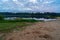 picnic area by the lake with wooden plank boardwalk