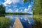 picnic area by the lake with wooden plank boardwalk