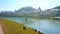 Picnic on bank of Salzach with a view on Salzburg Castle, Austria