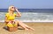 Picnic on the Beach. Blonde Young Woman