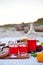 Picnic on the beach at sunset in the white plaid, food and drink