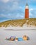 Picnic on the beach Texel Netherlands, Lighthouse of Texel with picnic basket
