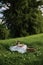 a picnic blanket spread out in a lush green field