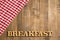 Picnic breakfast - Checkered red napkin and wooden letters. Background for design. Top view