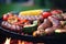 Picnic indulgence, steak, sausages, chicken, and veggies sizzle on BBQ