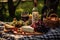 a picnic setup with a bottle of wine, cheese, and grapes