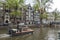 Picnic table boat on canal in Amsterdam