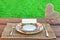 Picnic Table With Tableware, Wooden Heart And White Blank Signboard