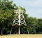 Picnic table under an oil well derrick