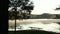 Picnic Tables Overlooking Beautiful Lake With Steam Rising At Sunrise