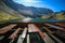 Picnic tables on the shores of the Balea Lake