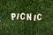 Picnic Wooden Sign On Grass
