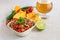 Pico de gallo or salsa fresca, made from tomato, onion, serrano pepper, lime juice, cilantro, and salt.