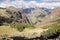 Pico do Arieiro hiking trail, amazing magic landscape with incredible views, rocks and mist, view of the valley between rocks