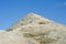 Pico Pilon de Azucar, people climbing the mountain. Colombian La Guajira desert. Landscape in the desert