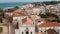 Pictoresque aerial drone view above City Center of Lagos sea port town, Portugal, with View of Church and city square