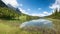 Pictorial lake Lautersee in may, with water reflection. Hiking area Mittenwald, bavaria