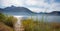 Pictorial lake mondsee, shore with reed grass, austrian mountain landscape