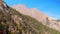 Picturasque view of Dombai mountains with bright blue sky at background. Warm autumn weather in mountains.