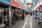 A picture of an alley in a Korean Local Market.