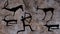 Picture of an ancient man. Rock paintings in the cave made ocher.