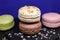 Picture of assorted macaroons close-up on a natural stone tray
