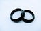 A picture of black rubber band  on white background ,