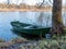 Picture by boat on the lake shore, frosted grass