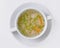 A picture of a bowl of traditional chicken soup served in a bowl over white background