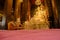 Picture of a buddhist monk meditating in Wat Bovoranives, Bangkok, Thailand.