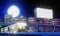 Picture of the city at night, there are train tracks to transport in the city. White blank billboard. Full moon night,  3d