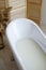 Picture of close up milk bath in cosy interior