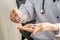 Picture of doctor hands pours out medicine, capsule or pill into her hand. Healthcare and medical concept