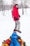 Picture of father of skating son on tubing in winter park