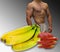 Picture of a fit, muscular body, fruits