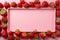 Picture frame crafted with strawberries, soft pink matte, and red