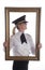 In a picture frame female airline pilot