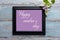 Picture frame with lilac flowers and Happy Mother`s day message on blue background