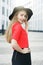 Picture of girl in red jacket and black hat