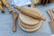 Picture of handmade wooden roti maker is displayed in a shop for sale in blurred background. Indian handicraft.Selective Focus