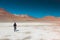Picture of a human on salty mineral land in Eduardo Avaroa Andean Fauna National Reserve